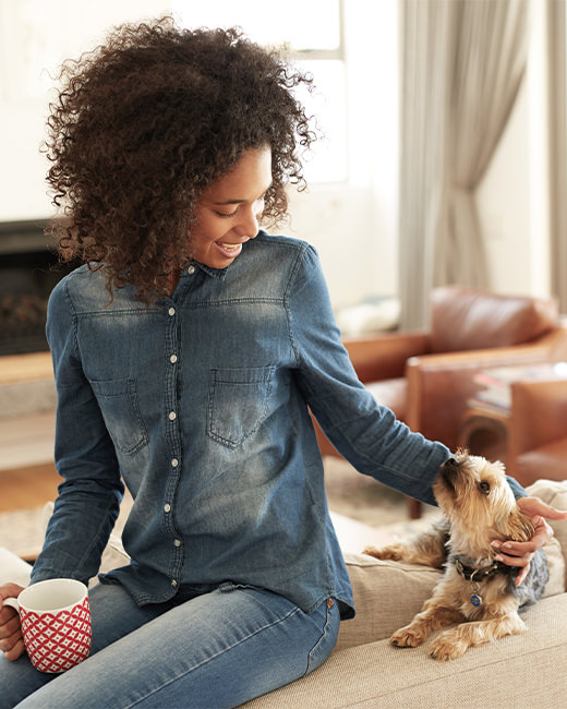 Woman petting her dog