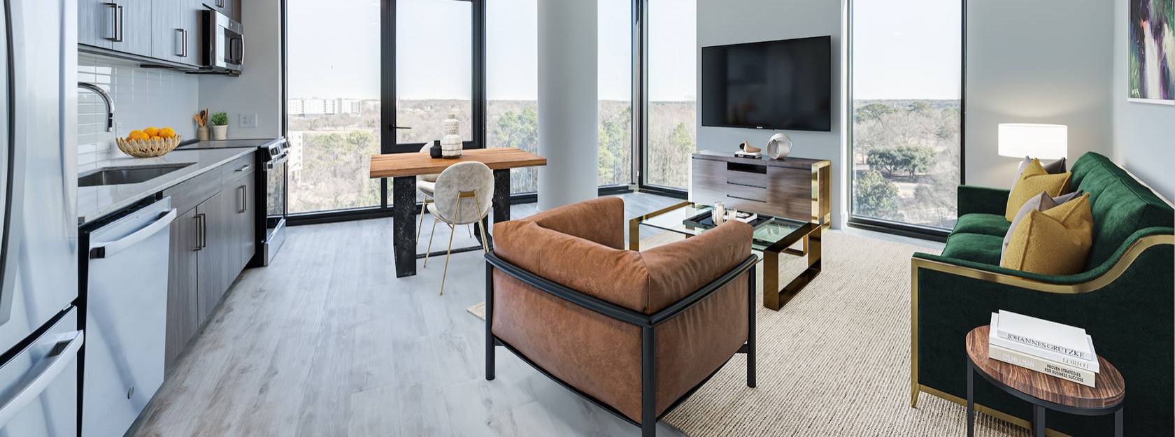 open concept apartment interiors surrounded by windows