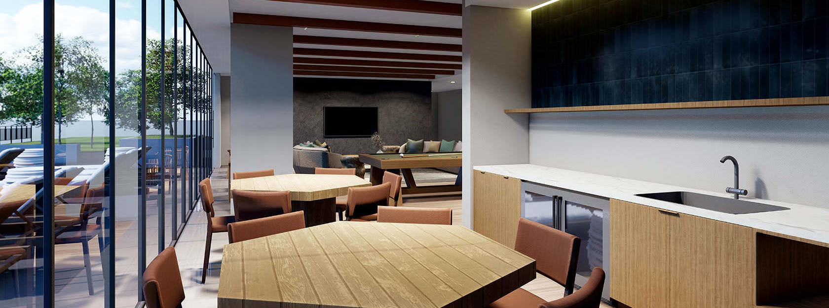 lounge with kitchen, tables and chairs